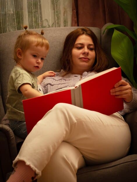 A close-up photo of a mother and her child smiling while reading a bilingual book together, emphasizing the importance of early language exposure and bonding.