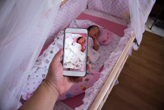 A baby lying on their back, looking up at a mobile hanging above their crib. The mobile is colorful and visually stimulating, providing a source of entertainment and distraction for the baby. The image promotes an environment of stimulation.