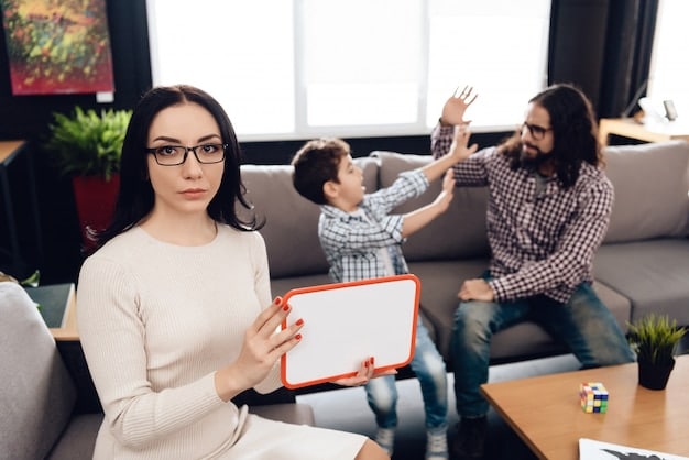 A parent calmly explaining a logical consequence to a child who is sitting on a chair, looking slightly remorseful. The environment is a simple kitchen with a table and chairs, emphasizing the everyday nature of discipline and learning.