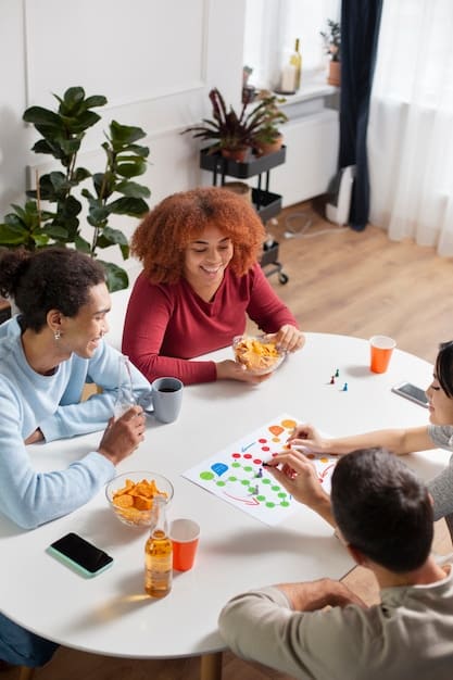 A family gathered around a table, laughing and playing a board game. The game board is colorful and engaging, and everyone seems to be having a good time.