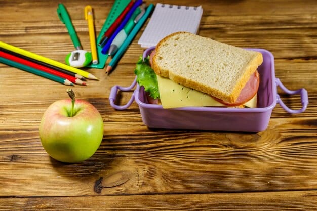 A variety of colorful and creatively arranged lunchboxes. One contains a sandwich cut into fun shapes, another has fruit skewers, and a third includes mini muffins and a small container of hummus with veggie sticks.