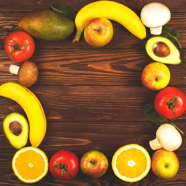An overhead shot of a colorful selection of fruits and vegetables that are ideal for making homemade baby food, including sweet potatoes, avocados, bananas, carrots, and apples.