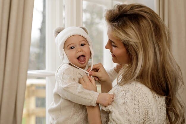 A mother gently massaging her baby's gums with a clean finger, showing a loving and caring interaction. The baby appears relaxed and comfortable.
