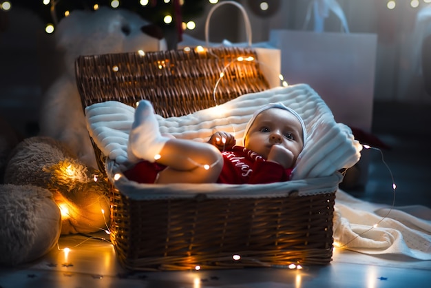 A serene nursery setting with dimmed lights, soft music playing gently in the background, and a comfortable massage area set up with a soft blanket and baby-safe massage oil.