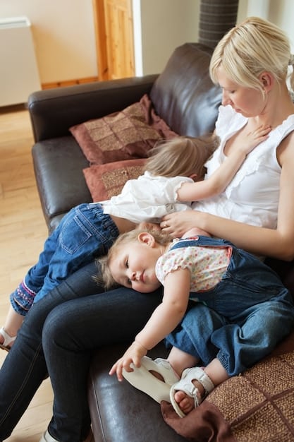 A mother comforting her child after they have an accident, showing empathy and support during potty training regression.