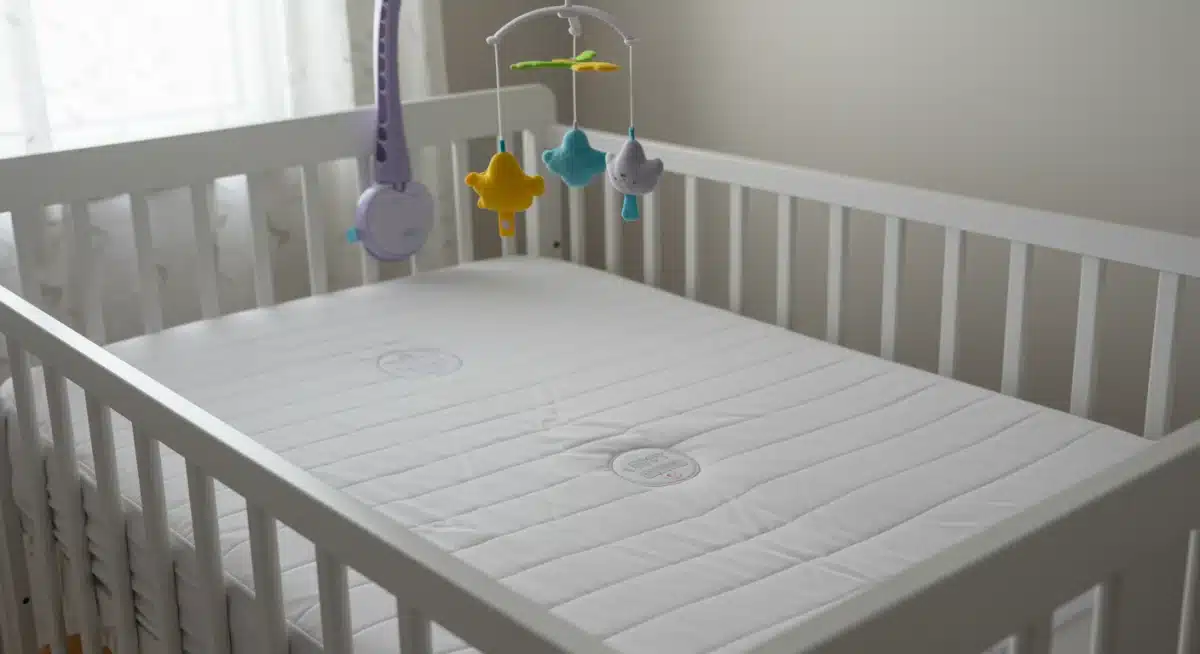 Safe crib setup with firm mattress and no loose items